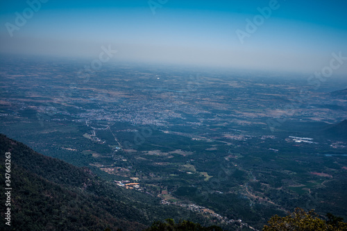 Ooty city aerial view, Ooty (Udhagamandalam) is a resort town in the Western Ghats mountains, in India's Tamil Nadu state. 