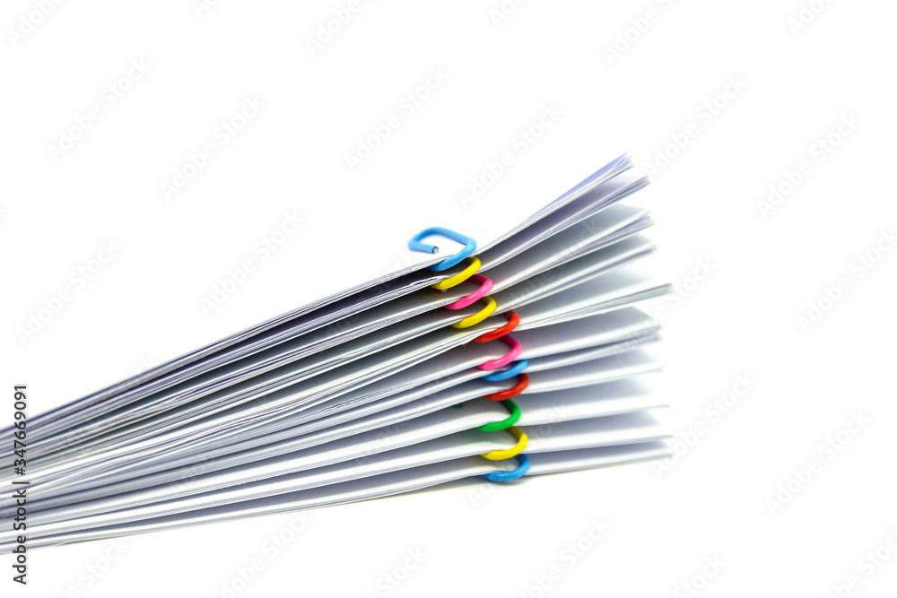 close up of Stack of papers files piles of unfinished documents achieves with paper clips close up of Stack of papers files piles of unfinished documents achieves with paper clips