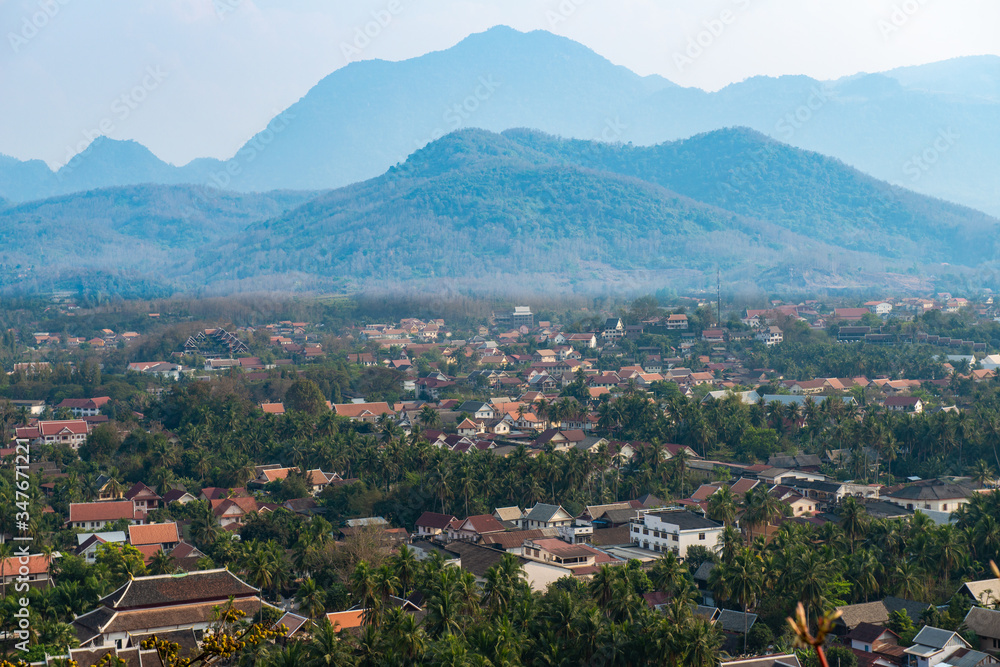 View of Luang Prabang town from the top of Mt.Phu Si (or Mt.Phou Si) high hill in the centre of the old town of Luang Prabang in Laos. Luang Prabang is popular UNESCO world heritage sites in Laos.
