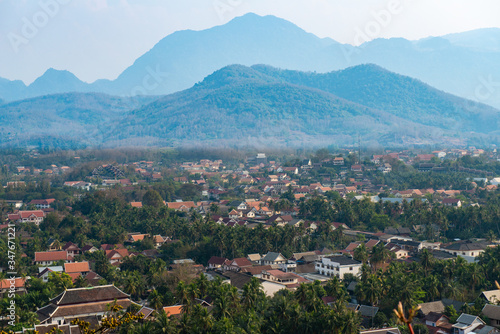 View of Luang Prabang town from the top of Mt.Phu Si (or Mt.Phou Si) high hill in the centre of the old town of Luang Prabang in Laos. Luang Prabang is popular UNESCO world heritage sites in Laos.