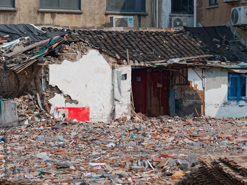 The waste land in the demolition site in Shanghai, China, the Chinese text means demolish.