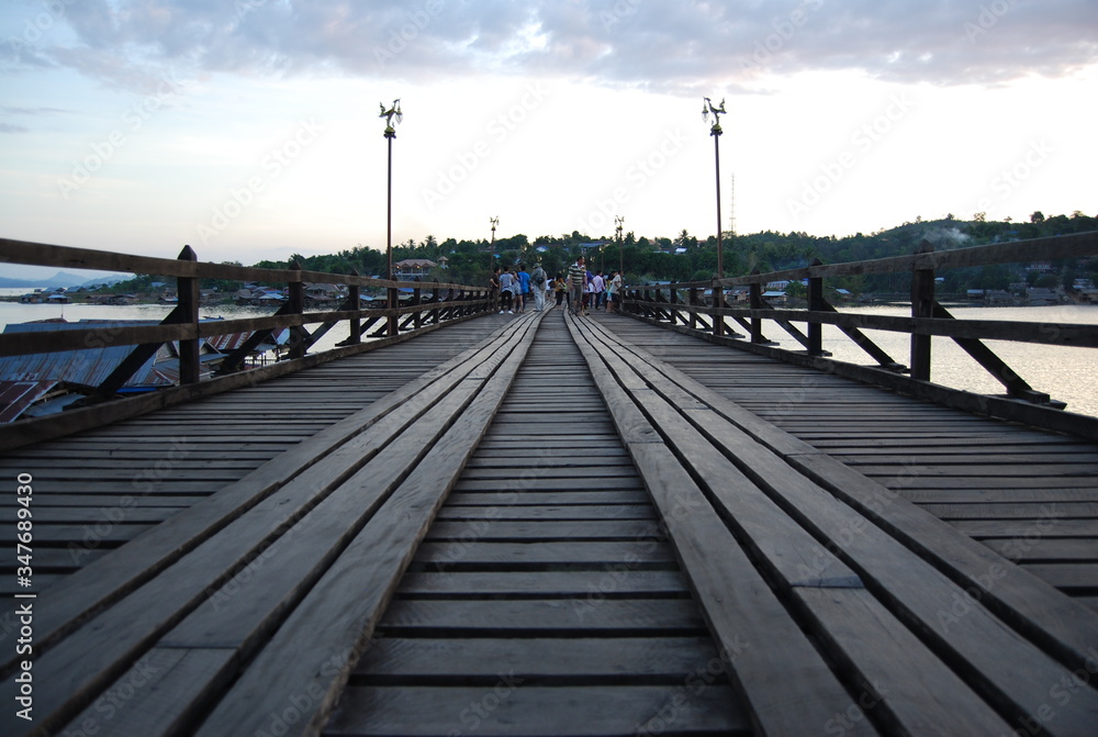 Uttamanusorn Bridge or commonly known as Mon Bridge, the longest wooden bridge in Thailand and is the second longest in the world.