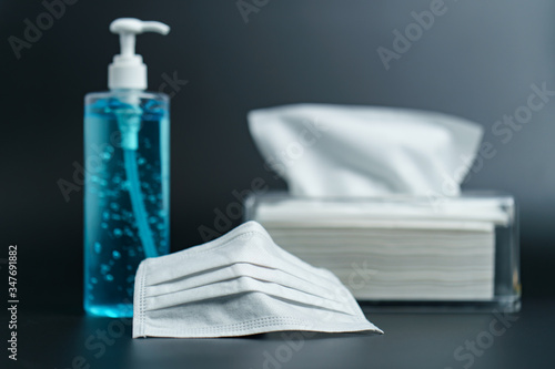 Obraz na płótnie Medical surgical mask and alcohol sanitizer hand gel for cleaning and protecting corona virus