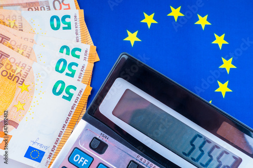 Banknotes, the EU flag and ...