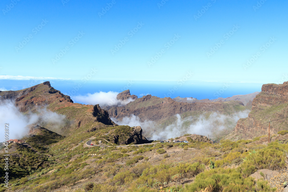 Road to village Masca and Masca Gorge and Atlantic Ocean on Canary Island Tenerife, Spain