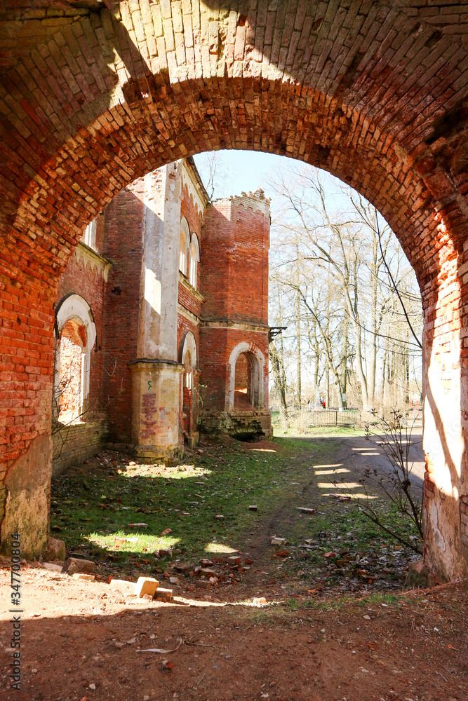 old abandoned picturesque red brick ruins of Estate of Baron Vrangel building in Leningrad region, Russia