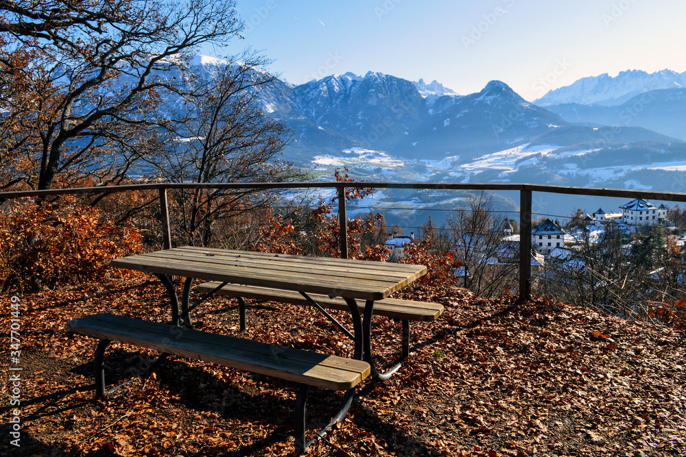 Two benches and a table on the observation deck overlooking the Dolomites. Two benches and a table on the observation deck overlooking the Dolomites.