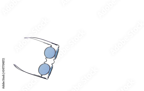 Blue sunglasses on the white background. Minimal summer concept. Copy space.Place for text and design. Isolated subject
