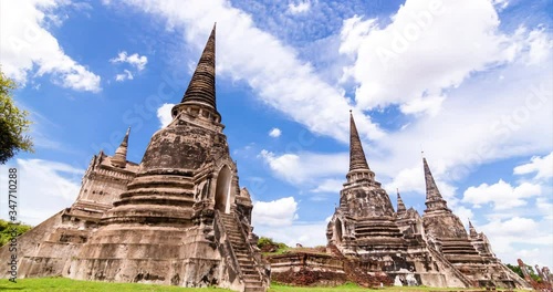 Timelapse white clouds gathered  ,Clouds fast forming , A group of clouds moving tee and forming a cluster, above the Wat Phasrisanphet , The old pagoda in Ayutthaya province in Thailand