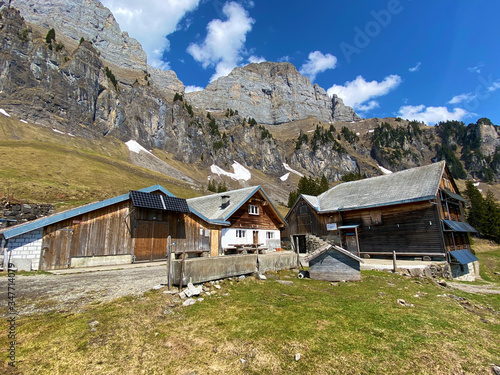 Alp Tschingla farm below Churfirsten mountain range and over Walensee lake, Walenstadtberg - Canton of St. Gallen, Switzerland (Kanton St. Gallen, Schweiz) photo