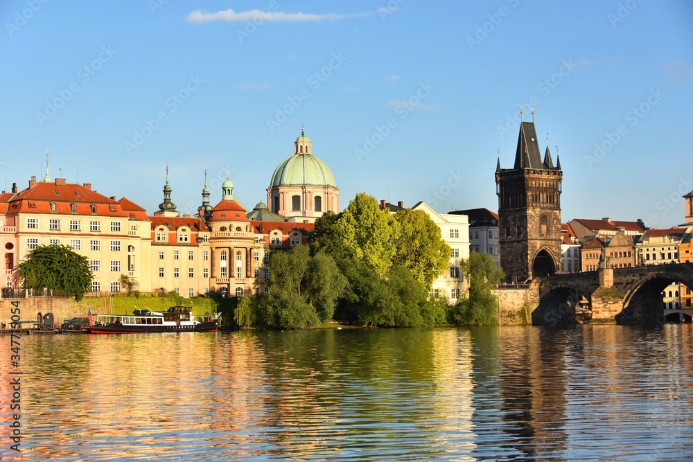 Naklejka premium Beautiful Prague cityscape along Vltava river in spring 