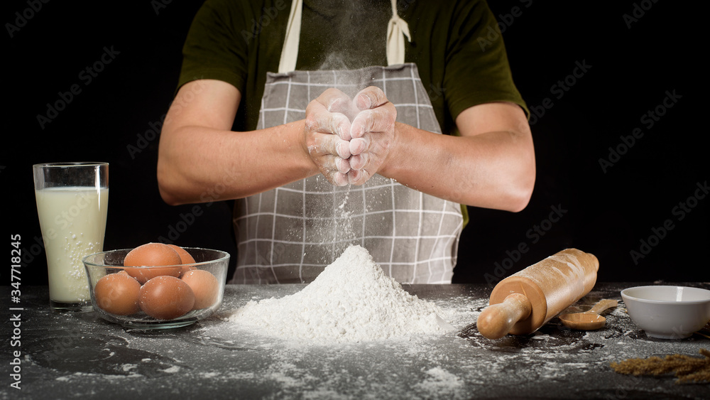 Fototapeta premium A man is baking homemade bakery