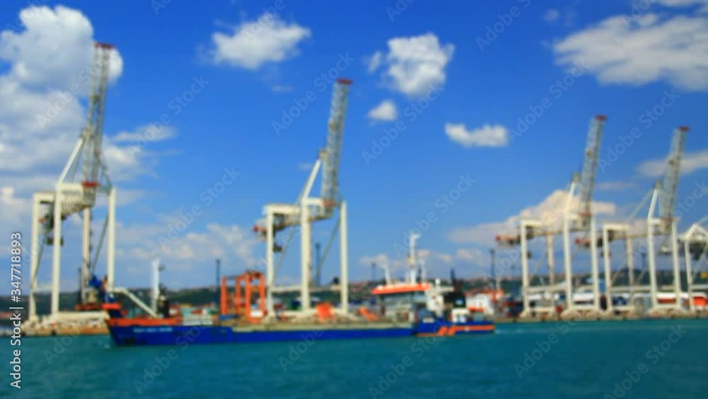 Port and big cranes for cargo to unload or load it on ships. Port and big cranes for cargo to unload or load it on ships.