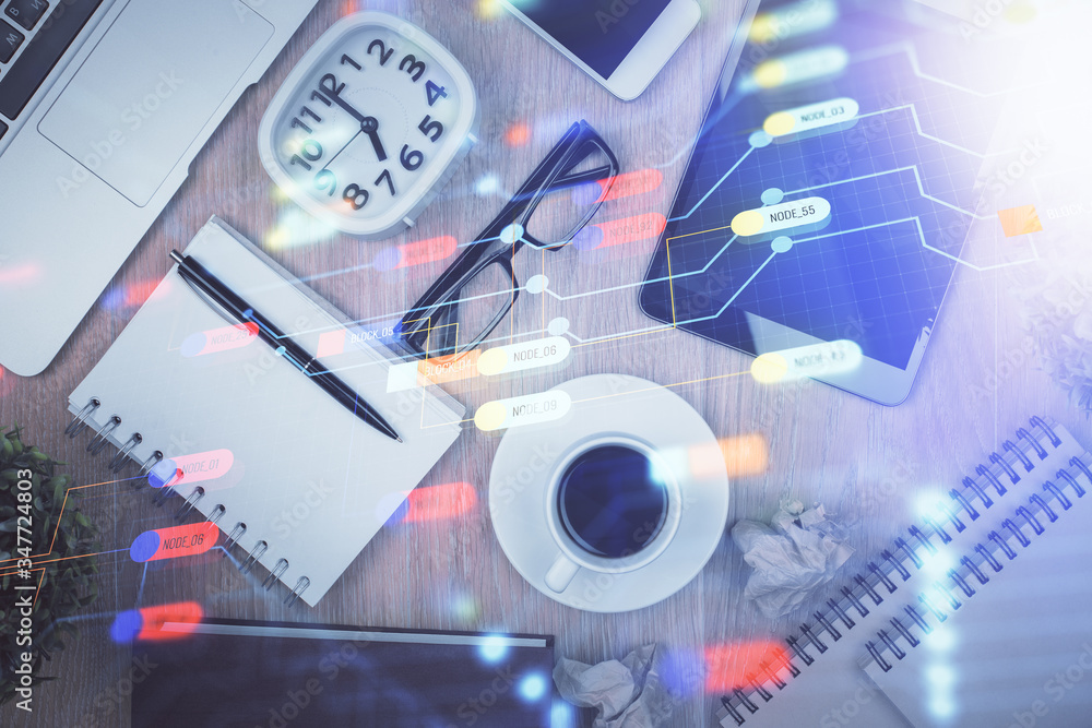 Double exposure of technology theme drawing over work table desktop. Top view. Global data analysis concept. Double exposure of technology theme drawing over work table desktop. Top view. Global data analysis concept.