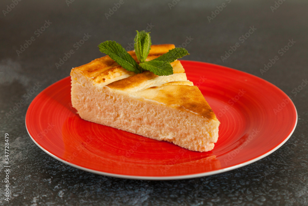 portion delicious cheesecake with mint leaf portion delicious cheesecake with mint leaf