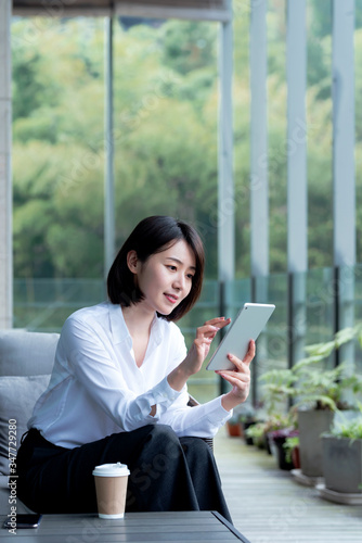 Asian business women working  in the outdoors