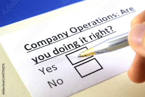 One person is answering question about company operations.