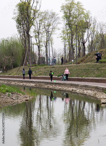 people on the lake in chengdu,china