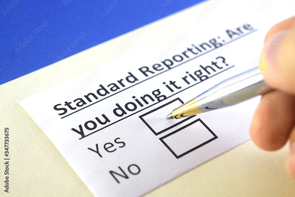 One person is answering question about standard reporting. One person is answering question about standard reporting.