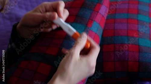 Positive pregnancy test in female hands