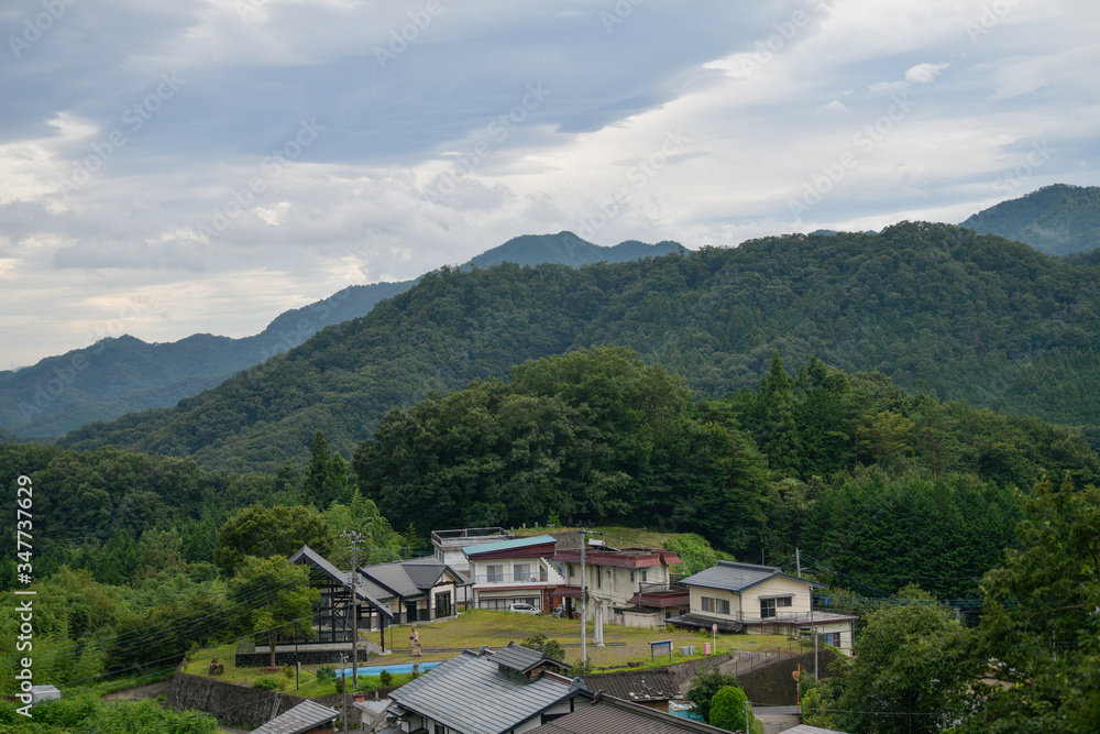 Obraz premium Japanese house built on a hill