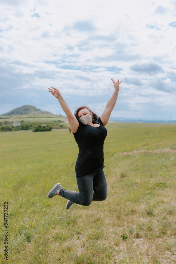 A woman walks in nature in the summer. A woman walks in nature in the summer.
