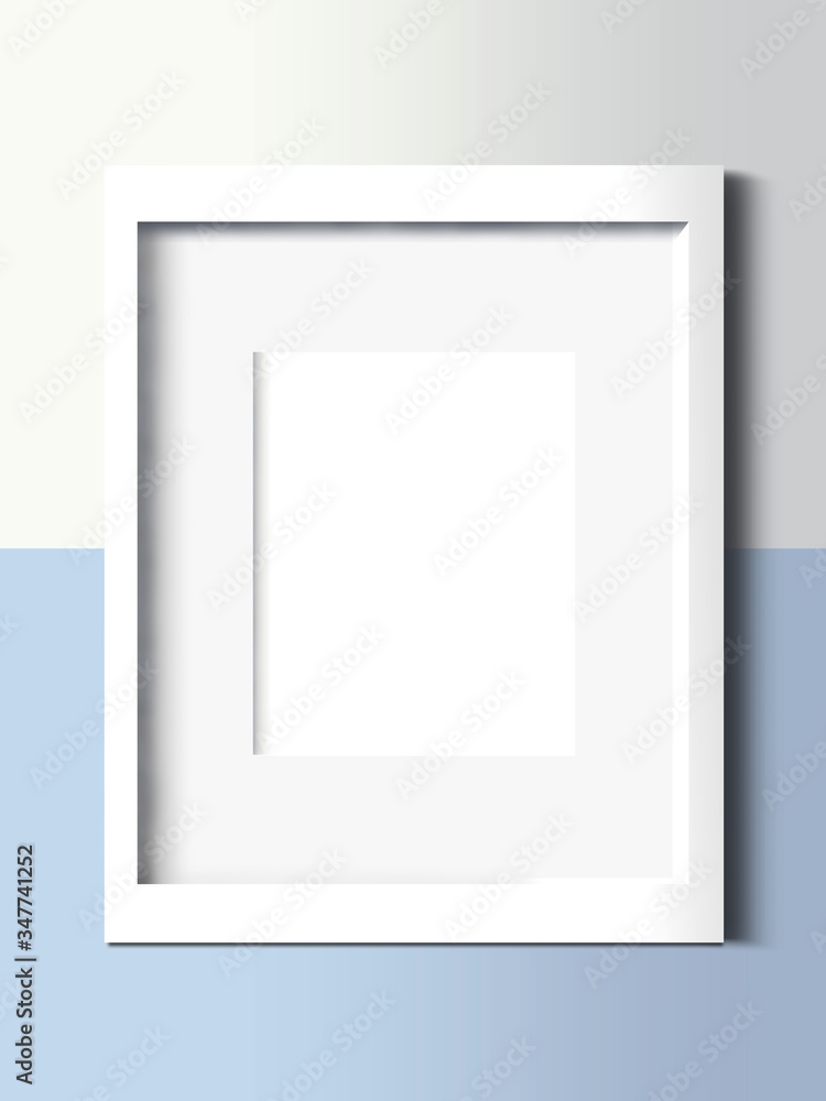 Vertical white 3D frame mock up on white and blue wall Vertical white 3D frame mock up on white and blue wall