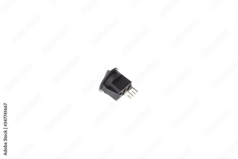 Back view of round two position black push toggle switch, isolated on white background Back view of round two position black push toggle switch, isolated on white background