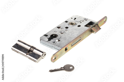 Fotografía Door lock element with key and key mechanism, isolated on white background