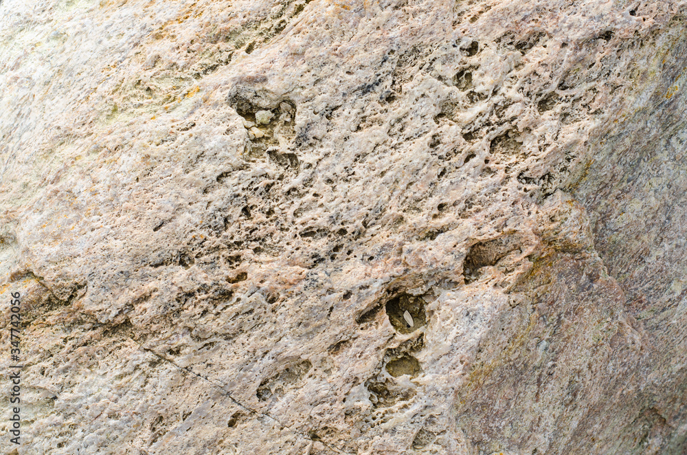 Granite. The structure of the stone. Rock. Granite. The structure of the stone. Rock.