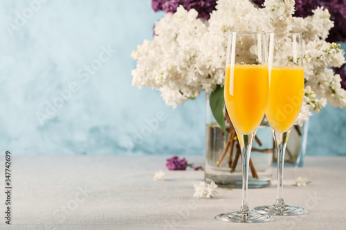 Two glasses of mimosa cocktail