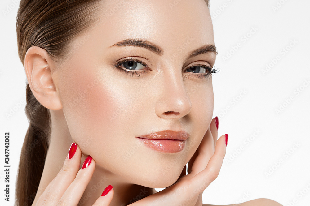 Woman beauty healthy clean skin manicure nails hand touching face spa beautiful female concept Woman beauty healthy clean skin manicure nails hand touching face spa beautiful female concept