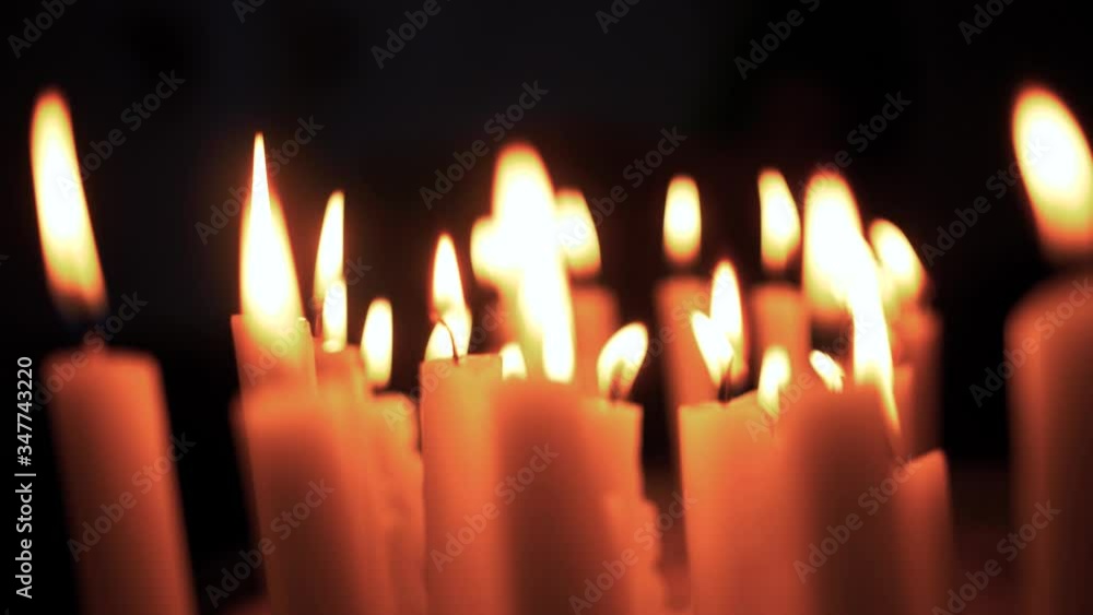 Many candles in the dark with a beautiful bokeh. Many candles in the dark with a beautiful bokeh.