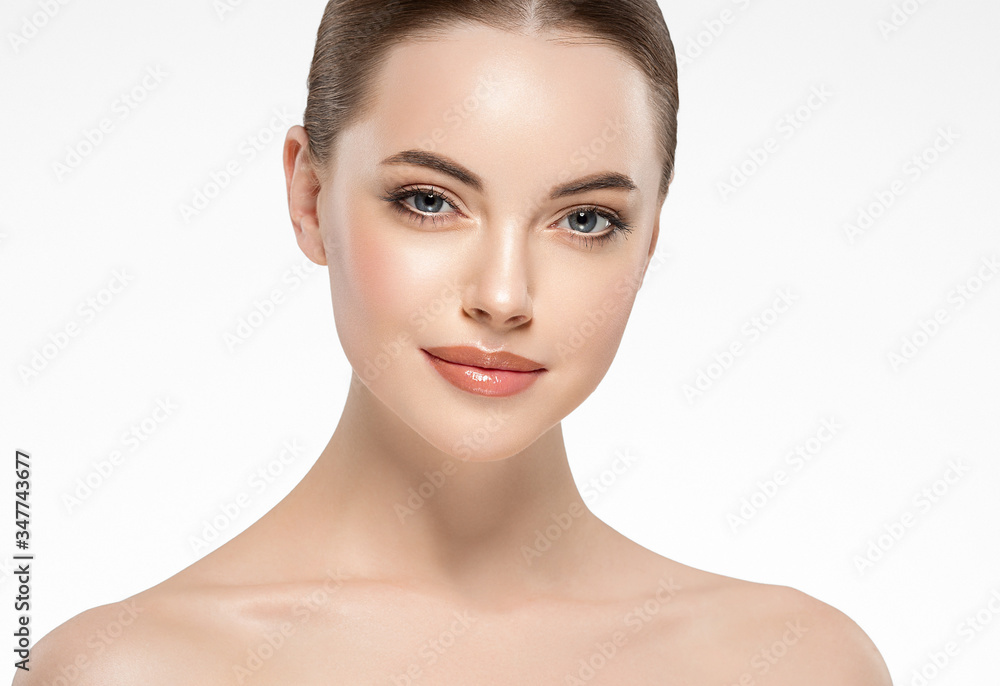 Beauty woman face clean healthy skin natural make up isolated on white Beauty woman face clean healthy skin natural make up isolated on white