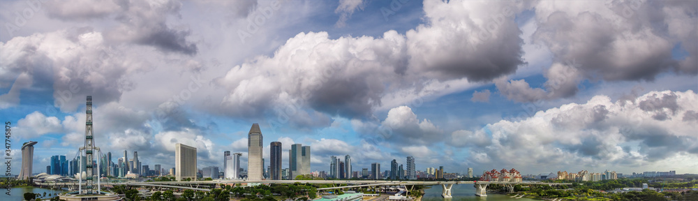 Panoramic aerial view of Singapore skyline from a drone point of view at dusk