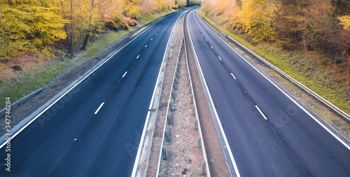 Empty dual motorway in UK - lockdown affects not only road traffic and transportation but also petrol prices photo