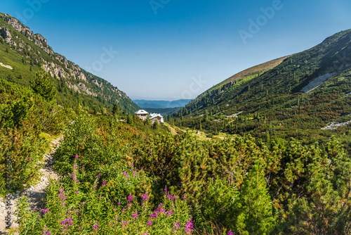 Beautiful summer mountain landscape in Rila mountain, Bulgaria. Mountain scenery and a mountain lodge.