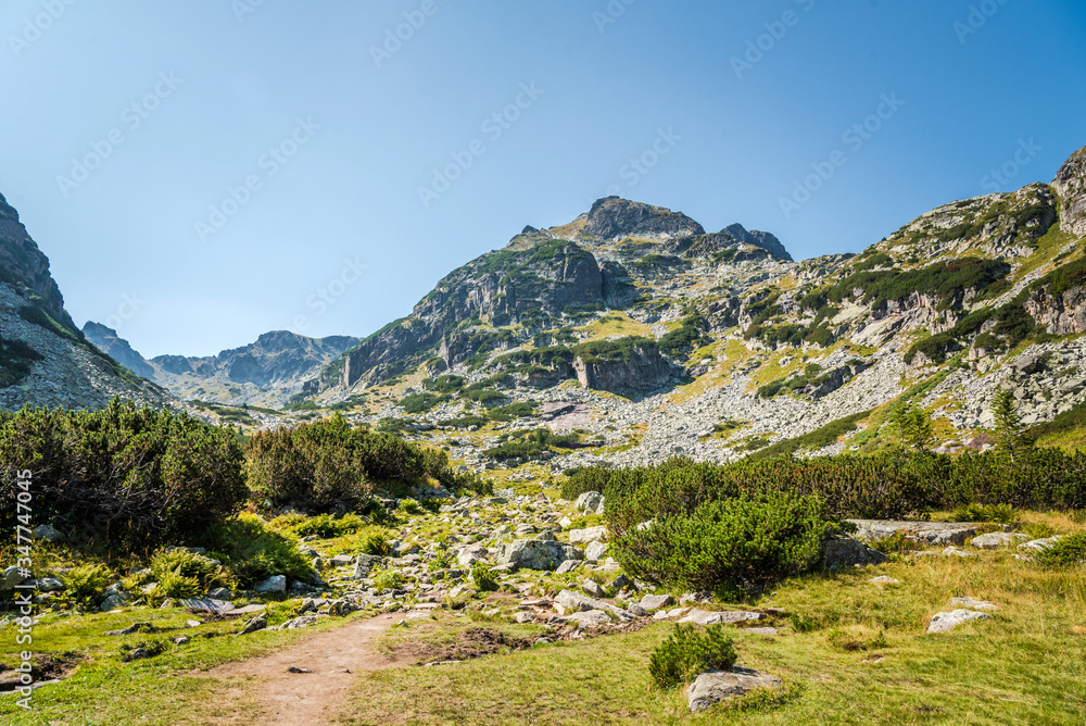 Beautiful mountain scenery in a sunny summer day. Rila mountain, Bulgaria. Hiking/ trekking concept.
