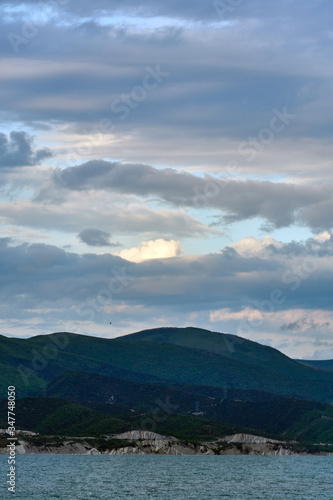 Clouds over the mountains © Roman Fomin