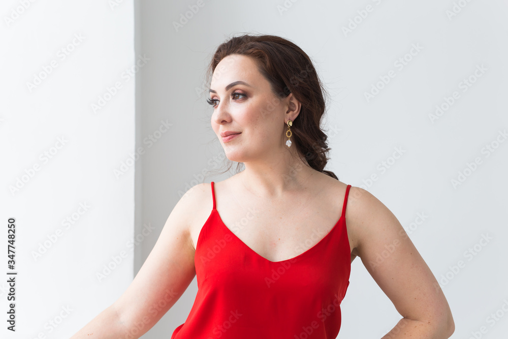 Close-up portrait of beautiful young woman with elegant hairstyle and luxurious jewelry and bijouterie. Close-up portrait of beautiful young woman with elegant hairstyle and luxurious jewelry and bijouterie.