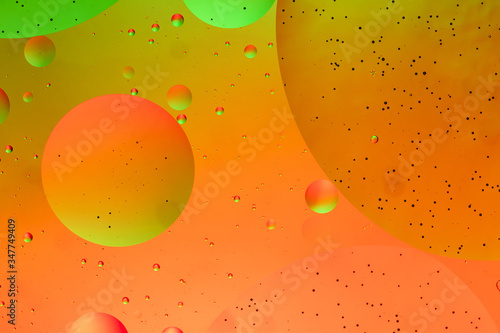 Abstract green and orange water bubbles background