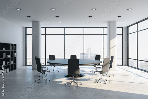 Bright conference room interior with panoramic city view.