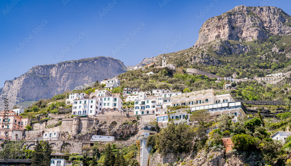 Hillside view of luxury villas on a summers day on the Amalfi coastline, Italy.