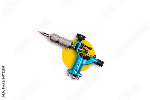 Cuadro en lienzo Blue tattoo machine isolated on white background