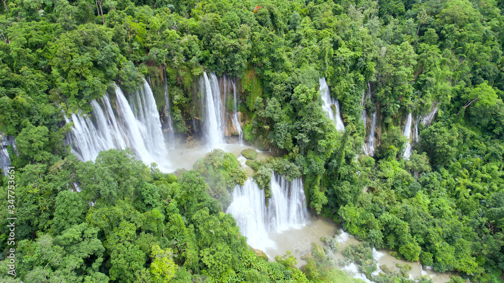 Naklejka premium Aerial View at Thi Lo Su waterfall in Umphang Wildlife Sanctuary. is claimed to be the largest and highest waterfall in northwestern Thailand.