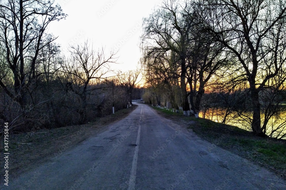 road at sunset in rural countryside at spring road at sunset in rural countryside at spring