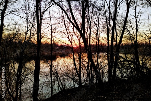Lake at sunset in rural countryside at spring