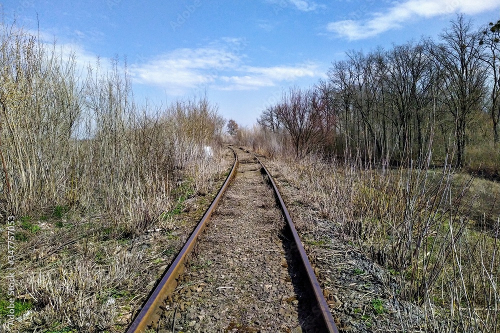 Railroad in rural countryside at sunny spring day Railroad in rural countryside at sunny spring day