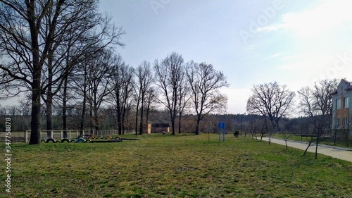 School yard in village at sunny spring day