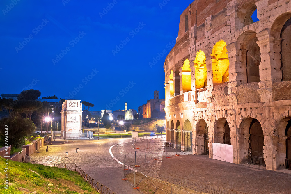 Rome. Colosseum of Rome and Arch of Constantine scenic evening view without people